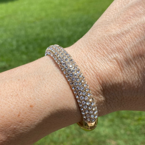 Crystal adorned gold tone hinge bangle bracelet - Picture 5 of 16